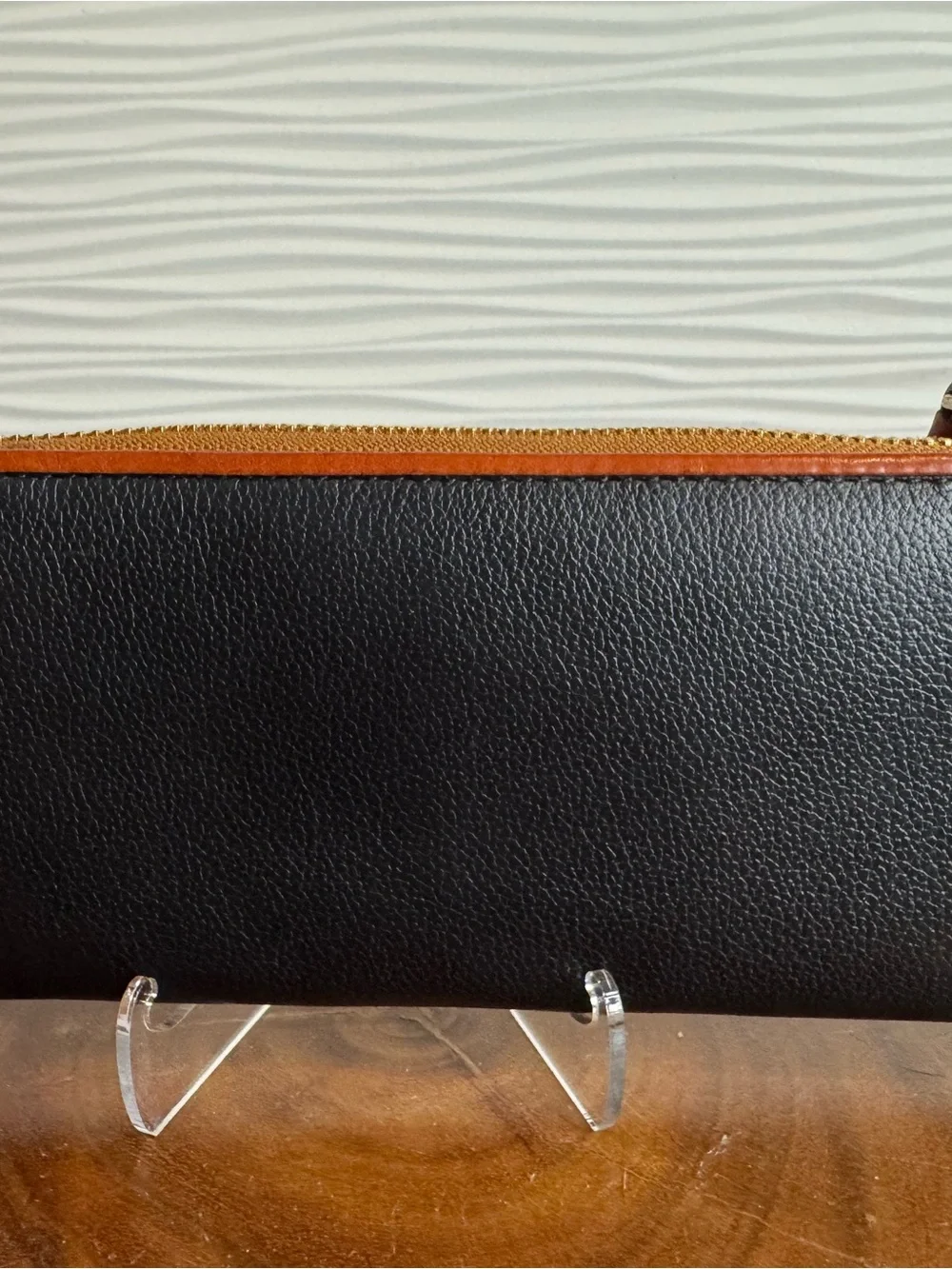 Dooney & Bourke Black Pebbled Leather Zip Wallet with Tan Trim and Logo Plate